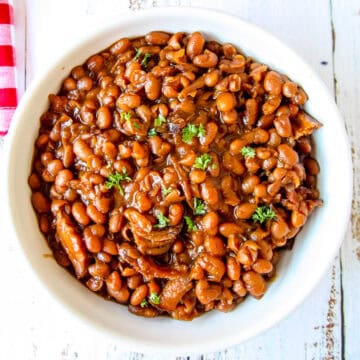 Slow Cooker Baked Beans in a white bowl.