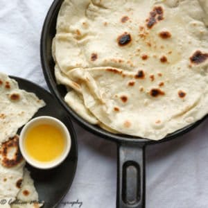 A skillet with homemade naan