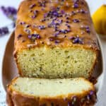 Lemon lavender cake with one slice removed.