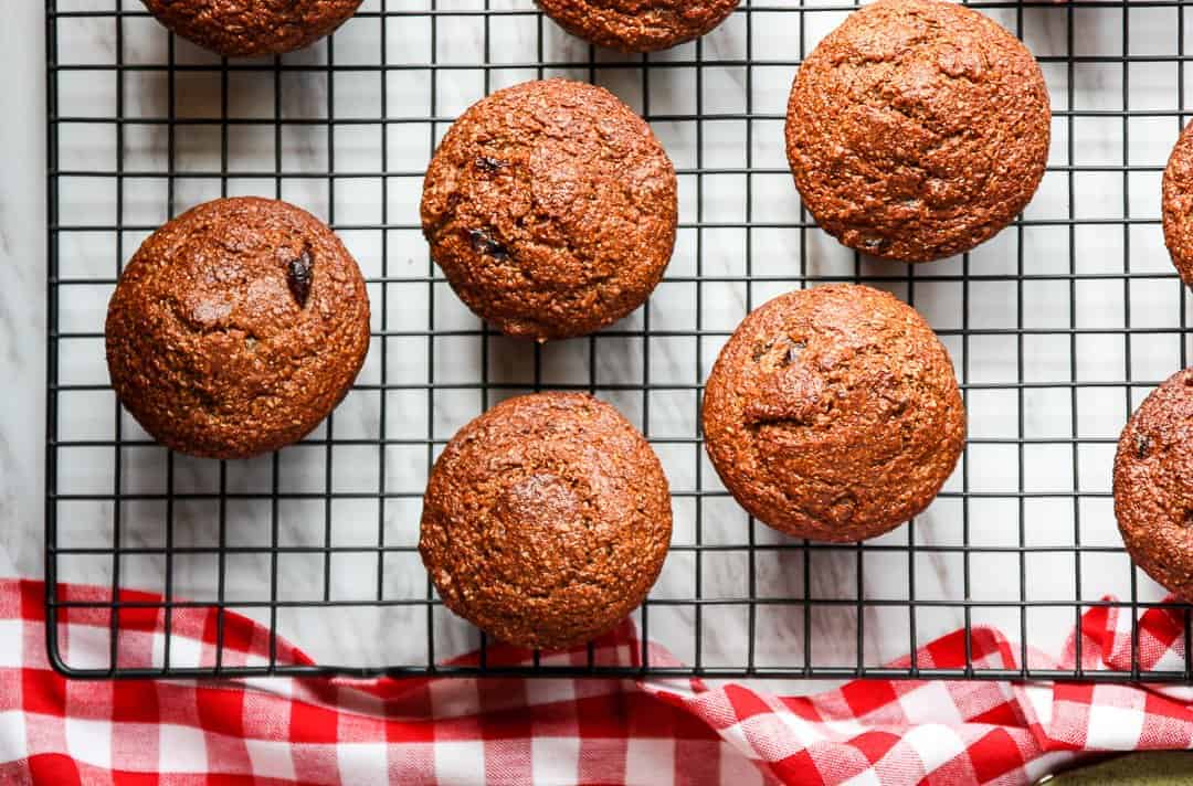 Baked muffins cooling on a wire rack