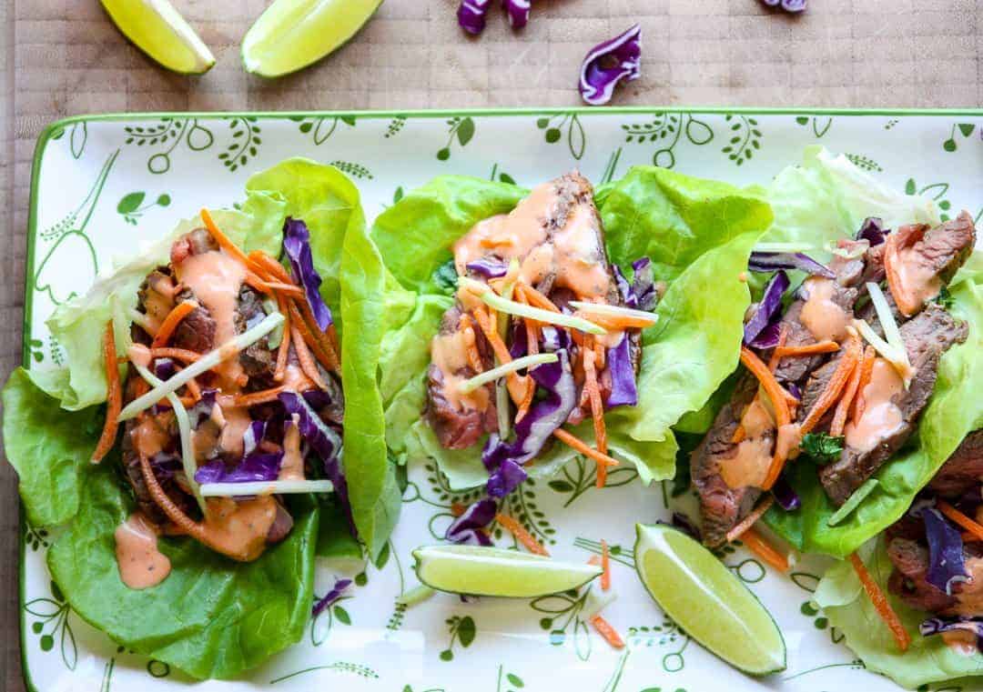 A plate of wraps with Steak and Lettuce