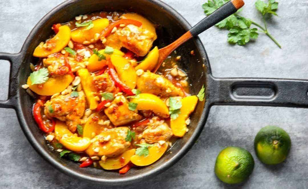 A pan of food, with Peach and Chicken