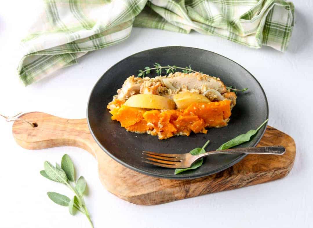 A plate of food on a table with a fork