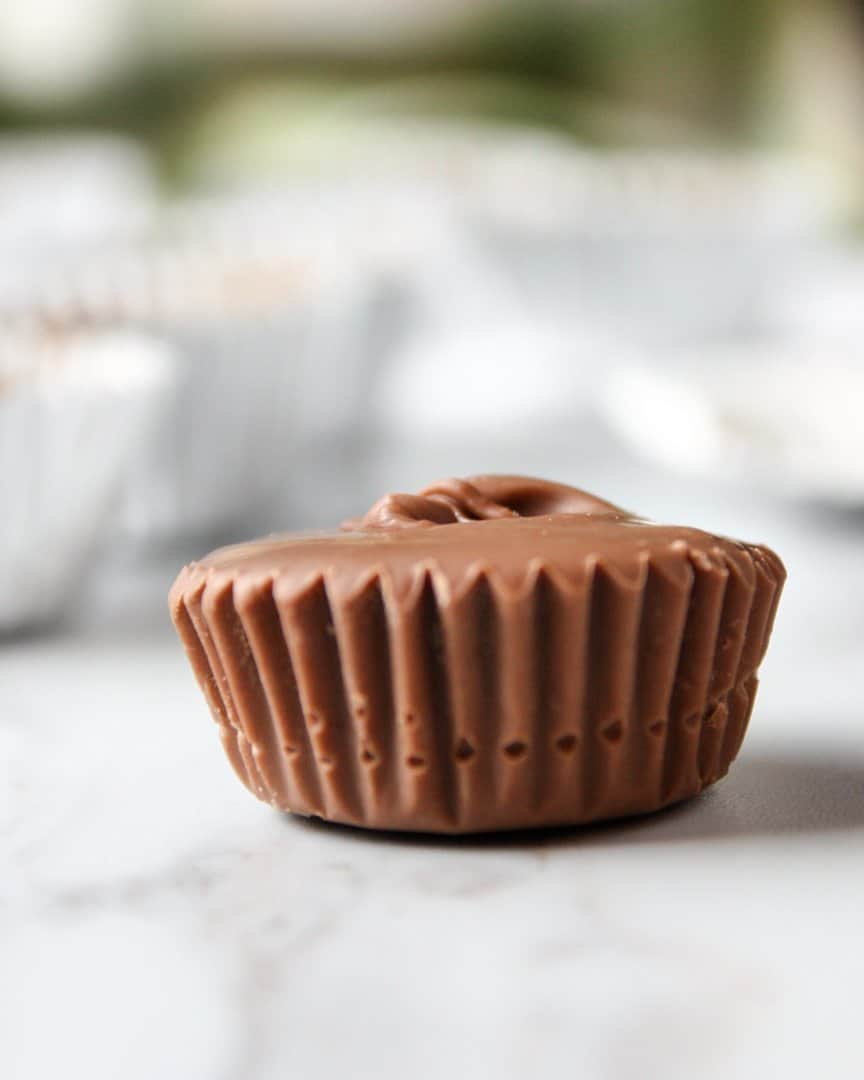 A close up of a peanut butter cup sitting on top of a table