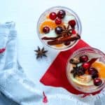 Two glasses of sangria on top of a table