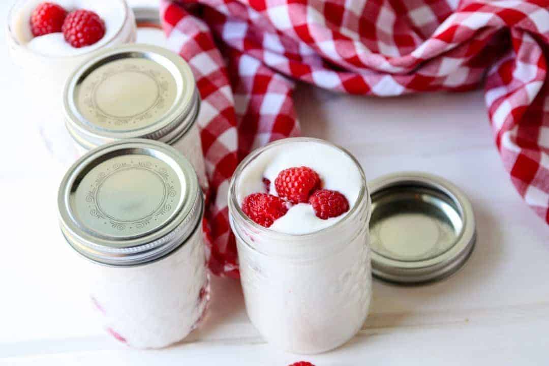 Coconut Mousse with Raspberries in Mason Jars