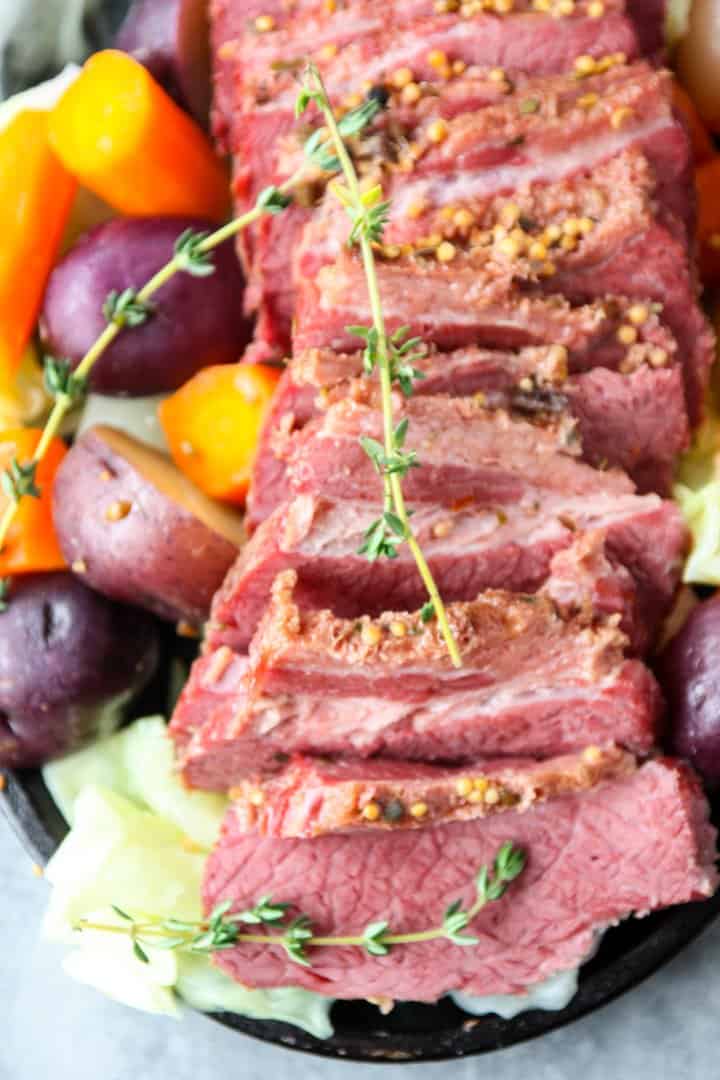 close up shot of sliced slow cooker corned beef and cabbage