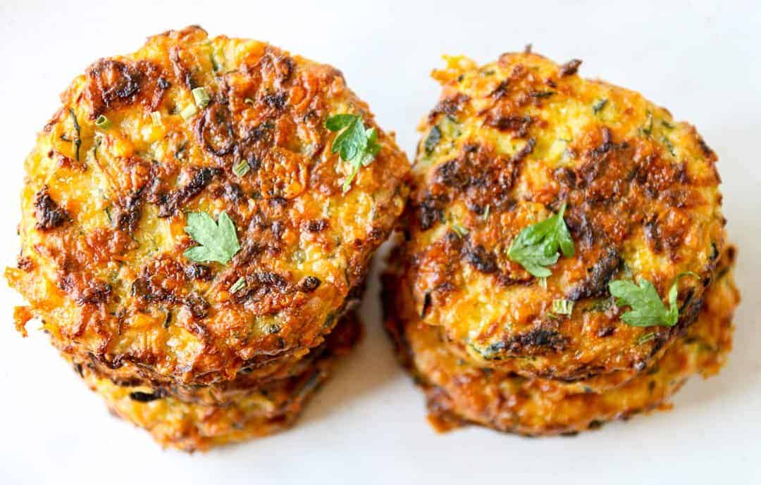 top down view of two stacks of baked zucchini fritters