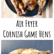 A whole roasted Cornish game hen on a black plate.