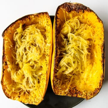Two halves of spaghetti squash after being air fried.