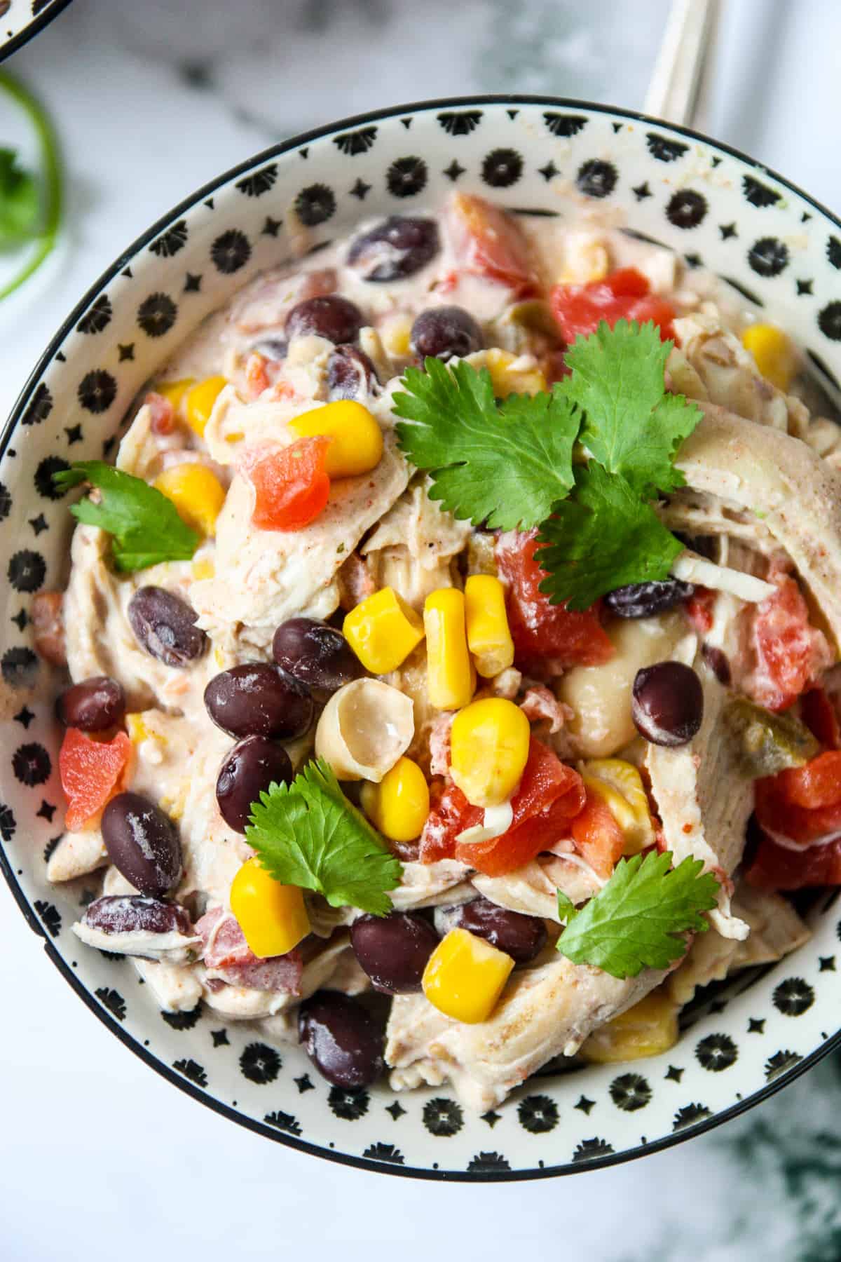 Slow cooker cream cheese chicken chili in a bowl ready to eat.