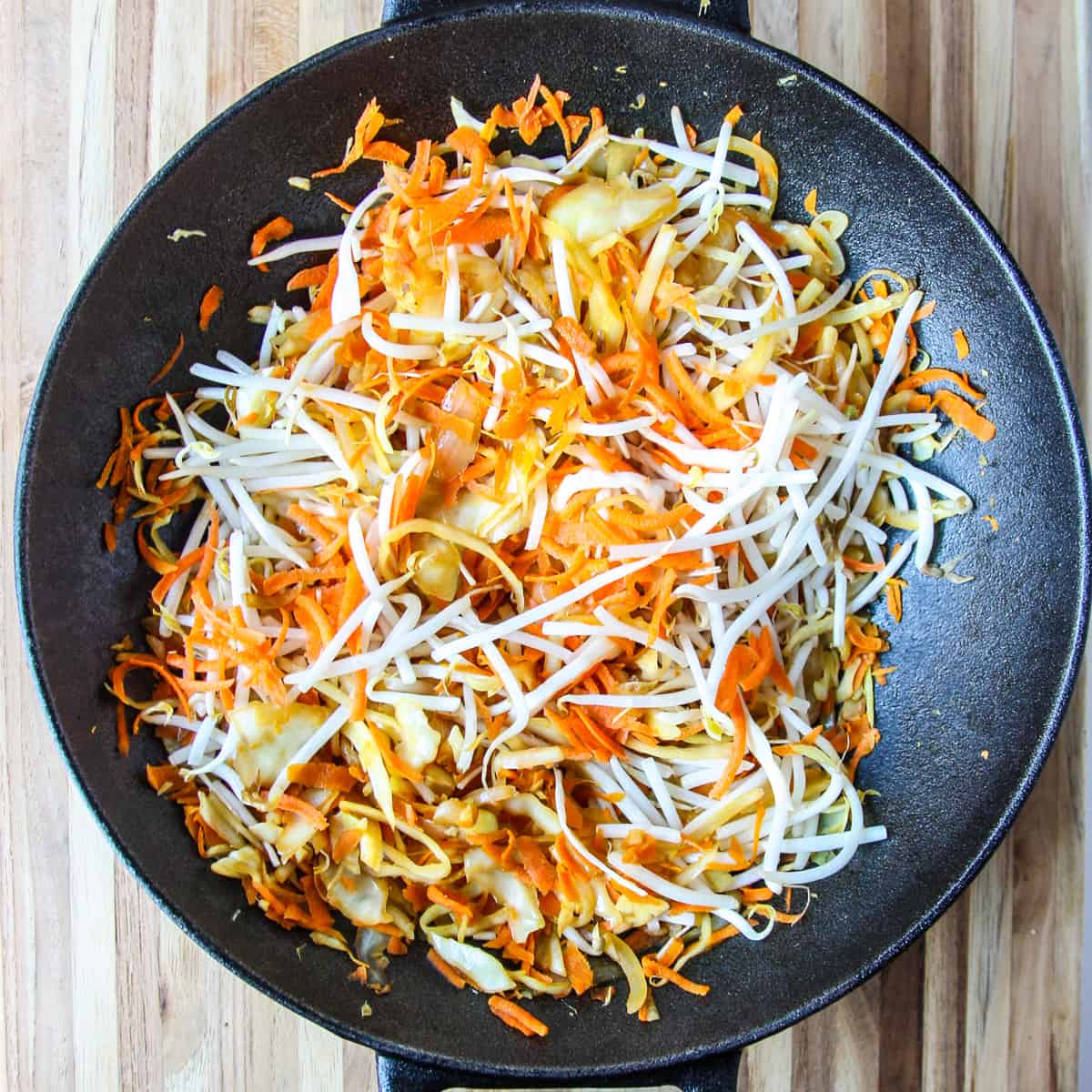 The finished stir fry topped with bean sprouts.