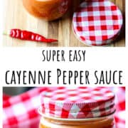 An open jar of cayenne pepper sauce and some fresh cayenne peppers on a wooden board.
