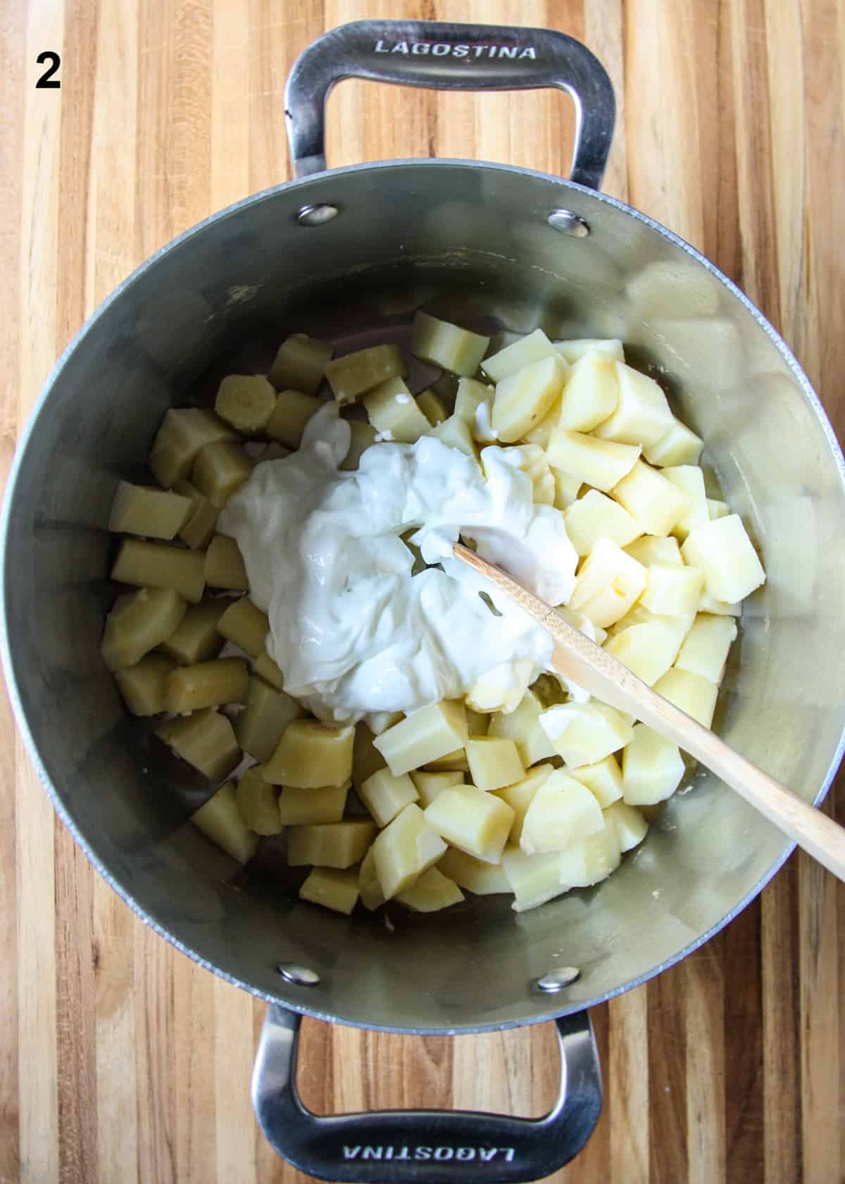 The cooked parsnips, drained and returned to the pot, along with butter and Greek yogurt.