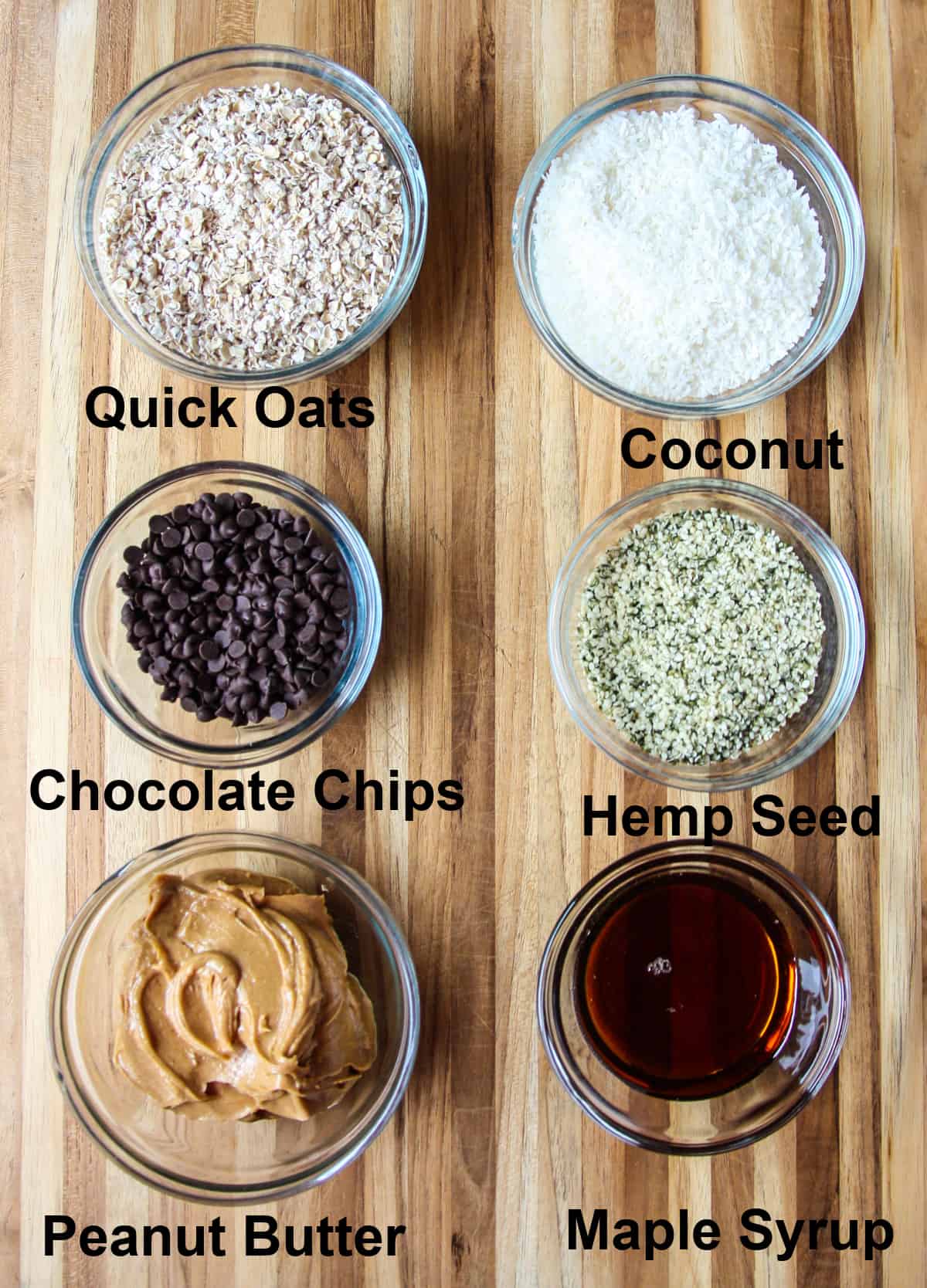 The ingredients for making this recipe in glass dishes, on a wooden board.