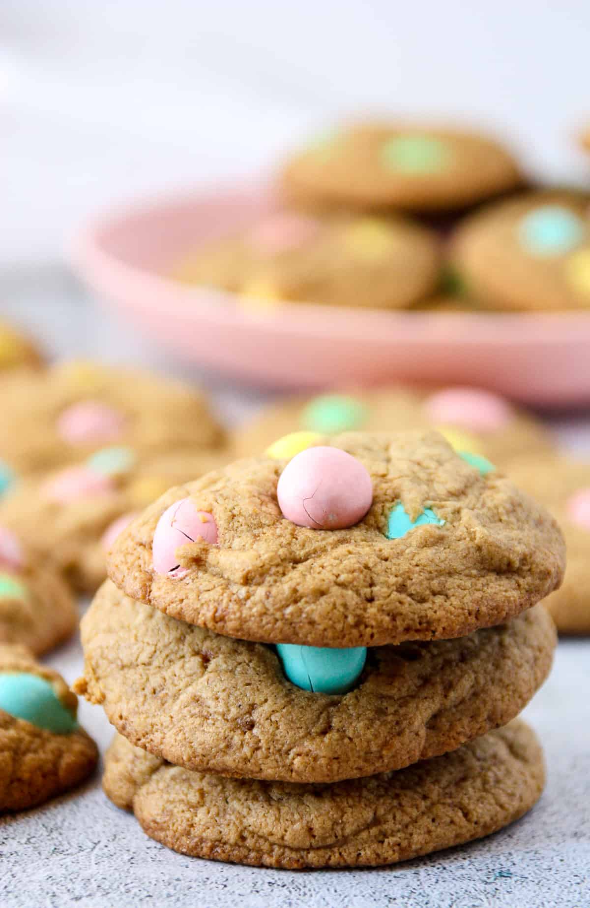A stack of three mini egg cookies.